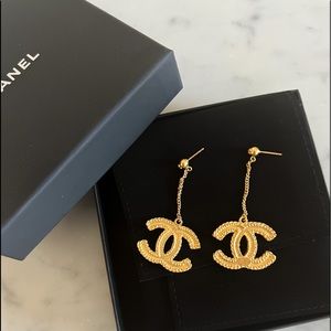 Chanel CC gold drop earrings.
